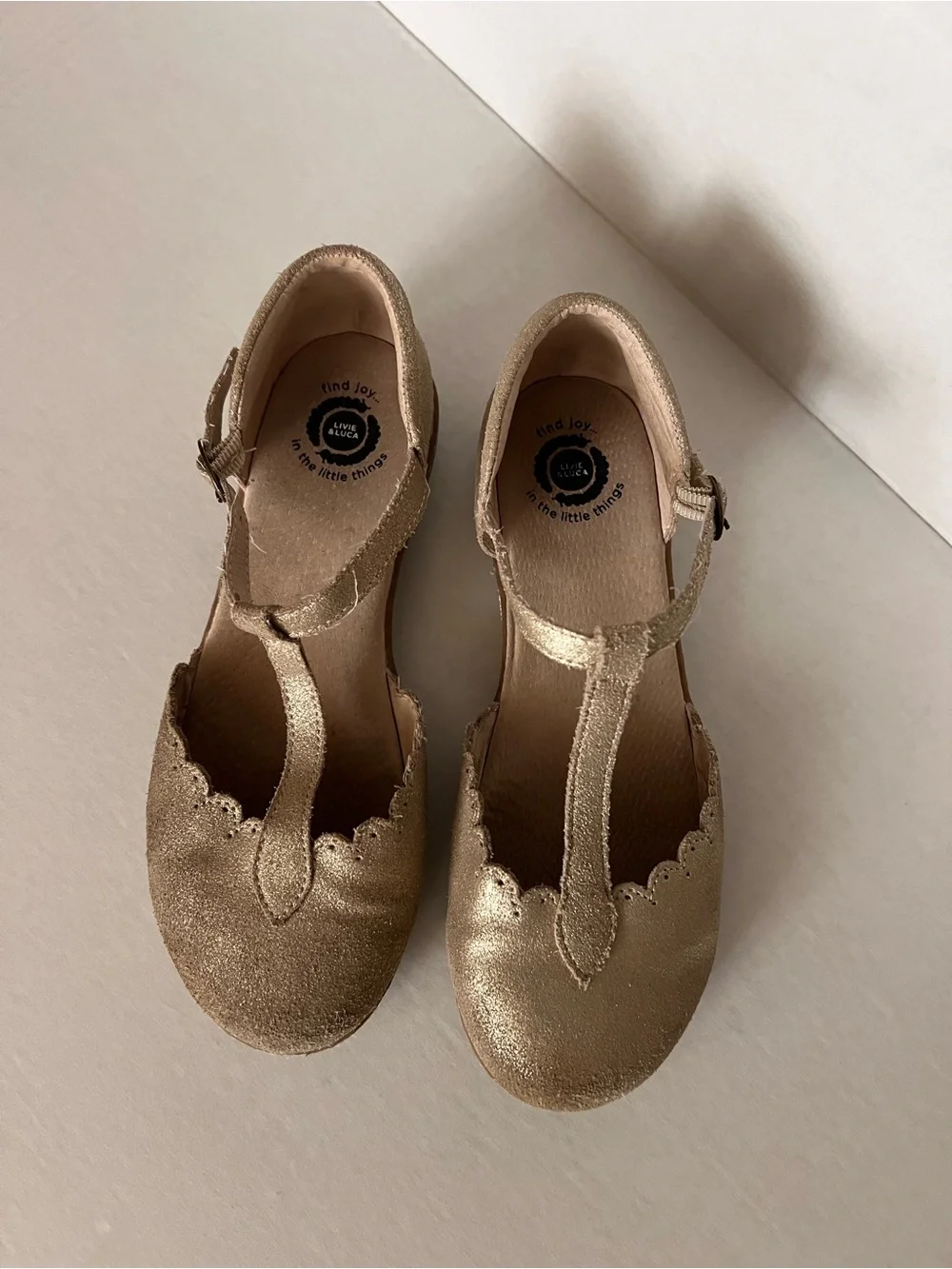 Livie & Luca Metallic Gold T‑Strap Scalloped Dress Shoes